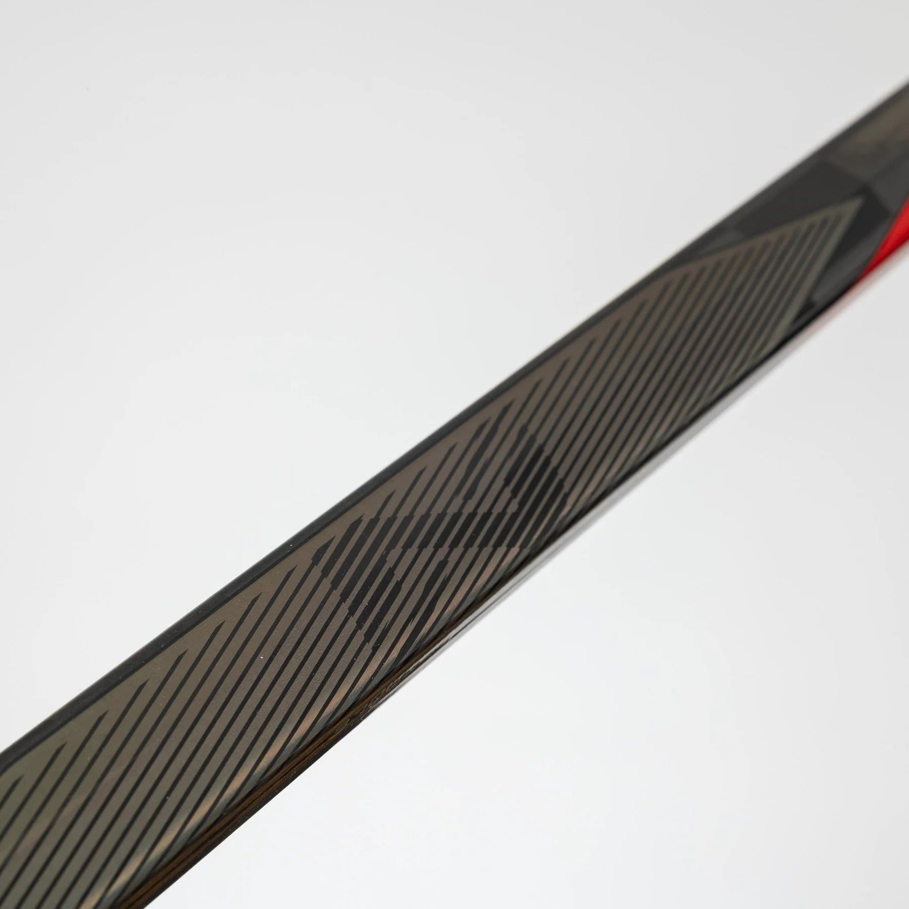 Bâton de hockey Bauer Nexus Colored Tracer Junior 2025 - Rouge