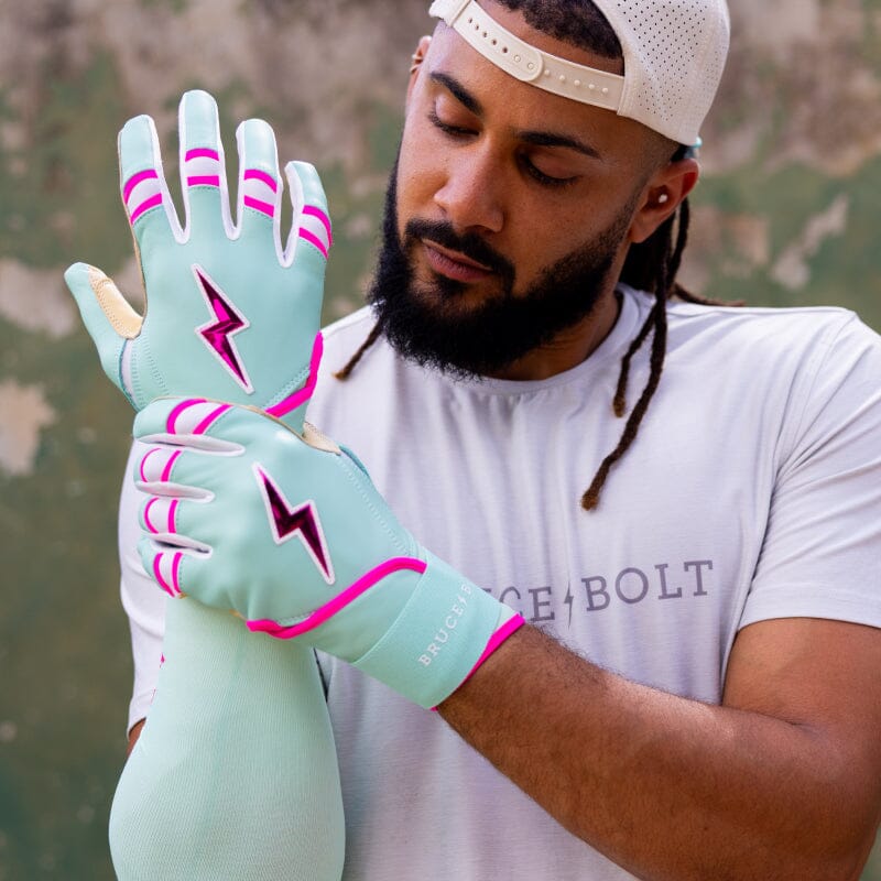 2026 Bruce Bolt Fernando Tatis Jr. Signature Series Long Cuff Batting Gloves BB-LCBG-FTJ25 - Youth - Mint / Pink